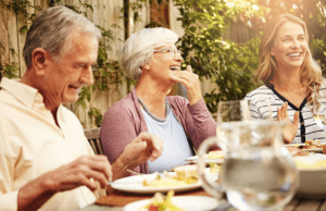 happy elderly people eating dietary protein for improving their health